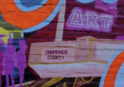 champaign county street art on brick exterior wall