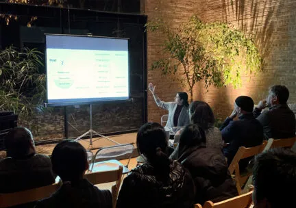 Ph.D. student presenting at an Erlanger Evening gathering.