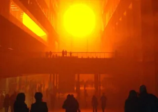 View of Olafur Eliasson's work "The Weather Project" as installed at the Tate Modern, London, England (2003)