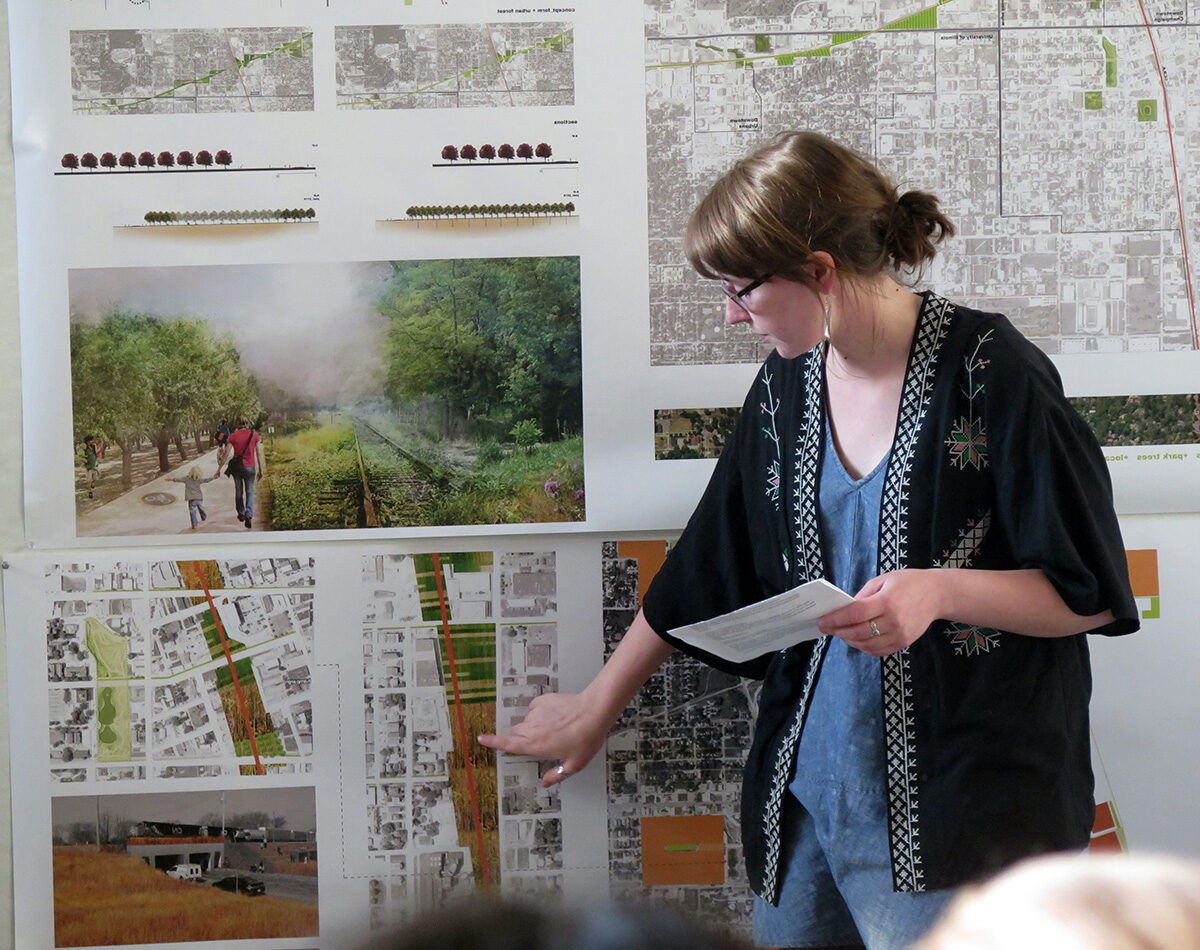 Photo of BLA candidate Madeline Schuette presenting work during a design review