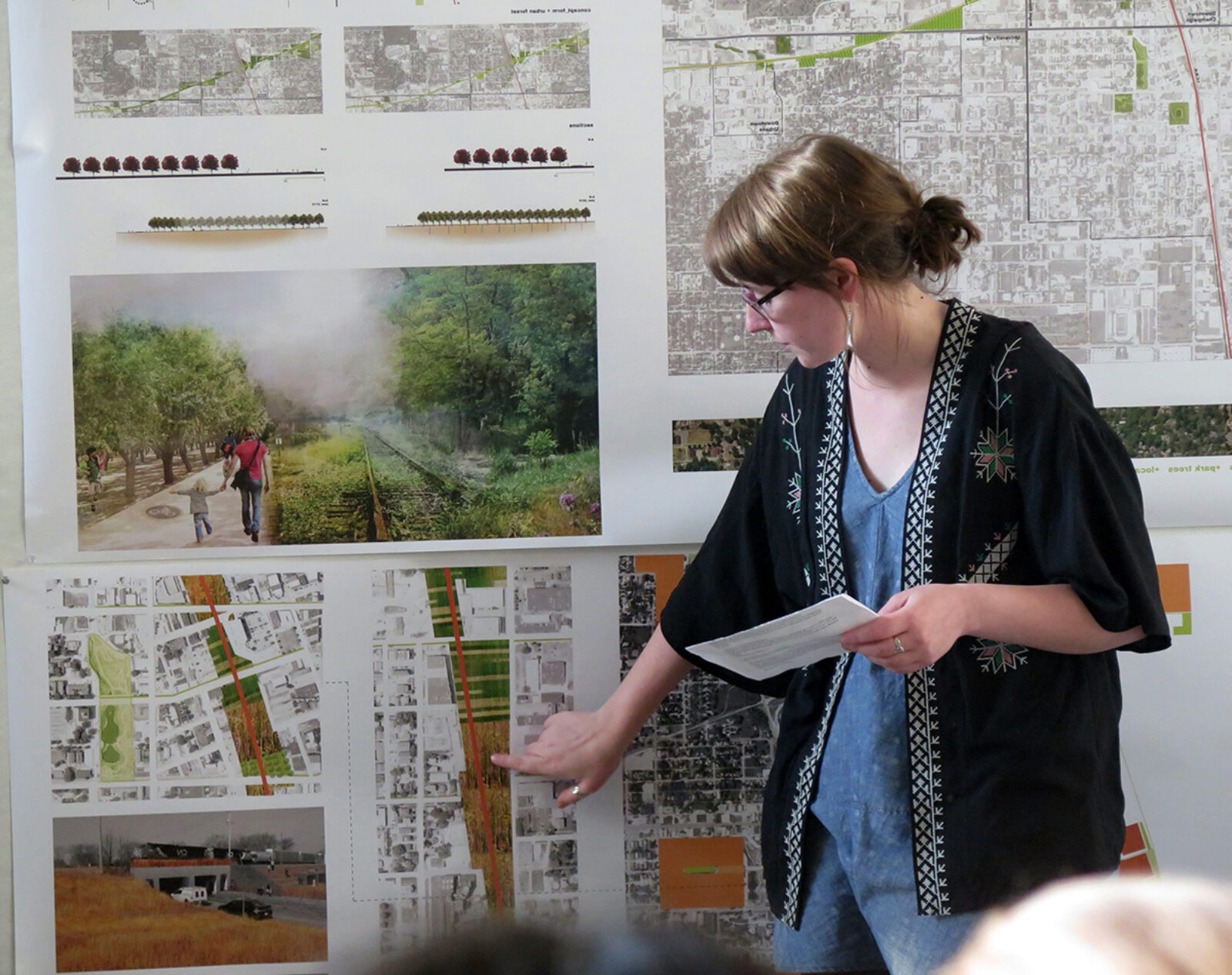 Photo of BLA candidate Madeline Schuette presenting work during a design review