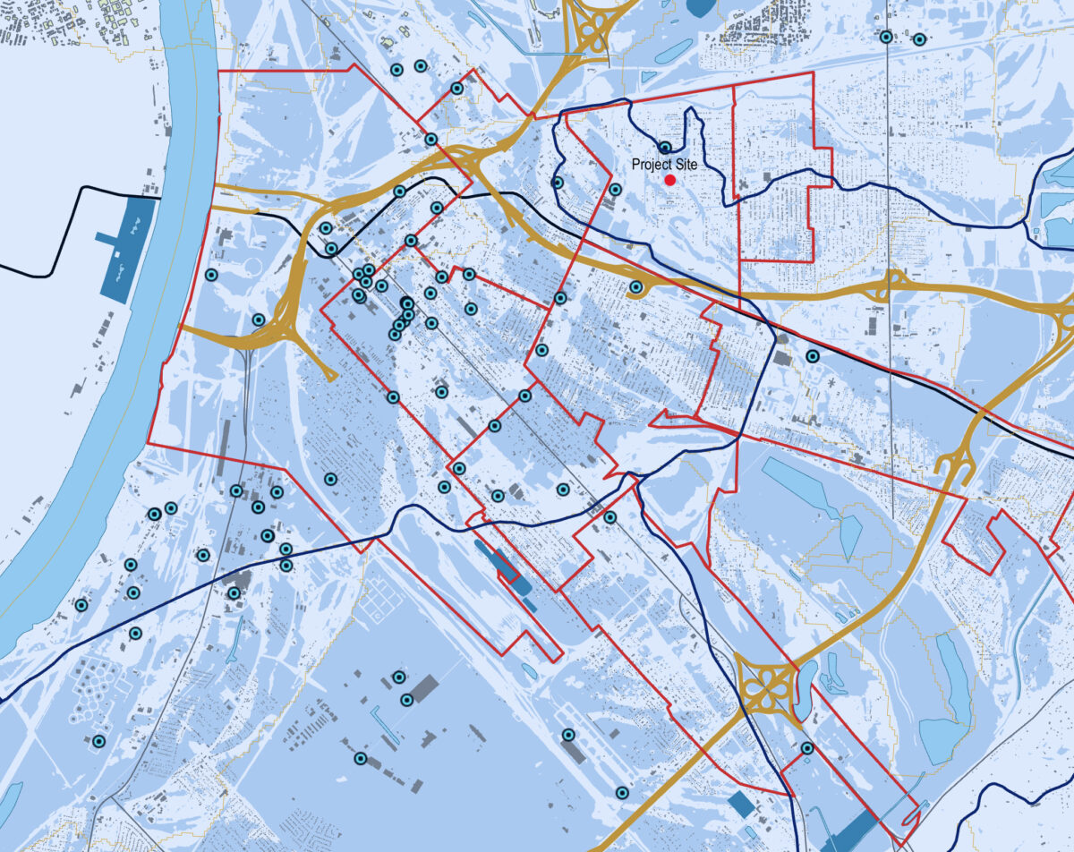 Plan of East St Louis, IL, with “Cultivating Green in the City” project site marked (red dot)