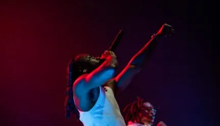 Johnny Venus and Doctur Dot, the duo that make up Earthgang, perform for fans at The Canopy Club on Sept. 20. Photo by Anika Khandavalli, Daily Illini.