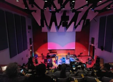 UIUC Faculty Josh Graham, percussion, Nicki Roman, saxophone, and Bernhard Scully, horn, perform Kerem Ergener's In Praise of Shadows in the Music Building Auditorium on Sept. 5, 2025 at PdMaxCon25~.