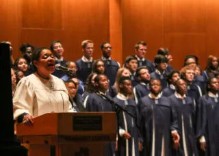 Choir director Ollie Watts Davis sings with the Black Chorus at Krannert Center for the Performing Arts on Oct. 1, 2017. Photo by Ben Tschetter
