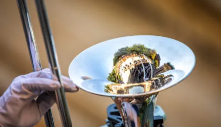 trombone pointed up in the air