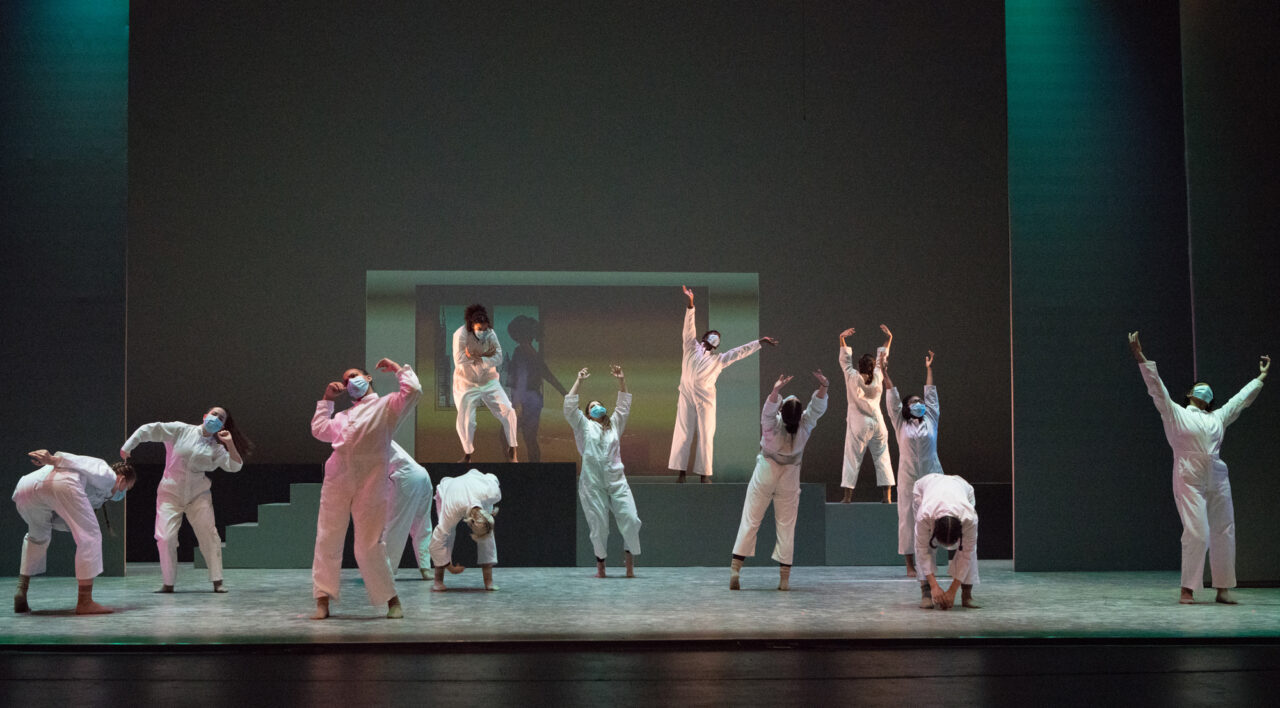 Dancers in white from Boxed choreographed by Endalyn Taylor, Department of Dance. Photo by Natalie Fiol.