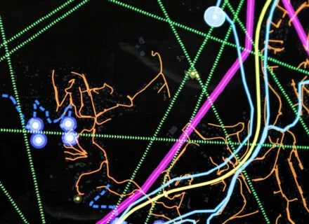 a drawn cityscape on clear material with repeating image behind