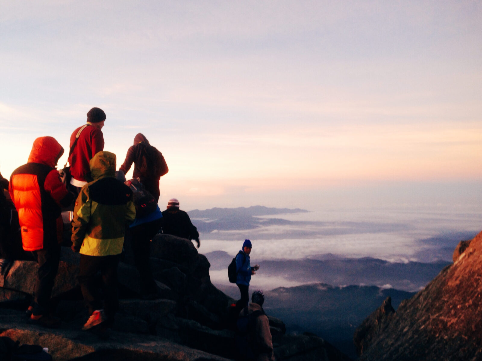 students from behind on mountains