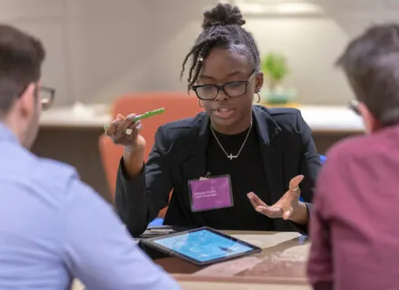 student talking with advisors