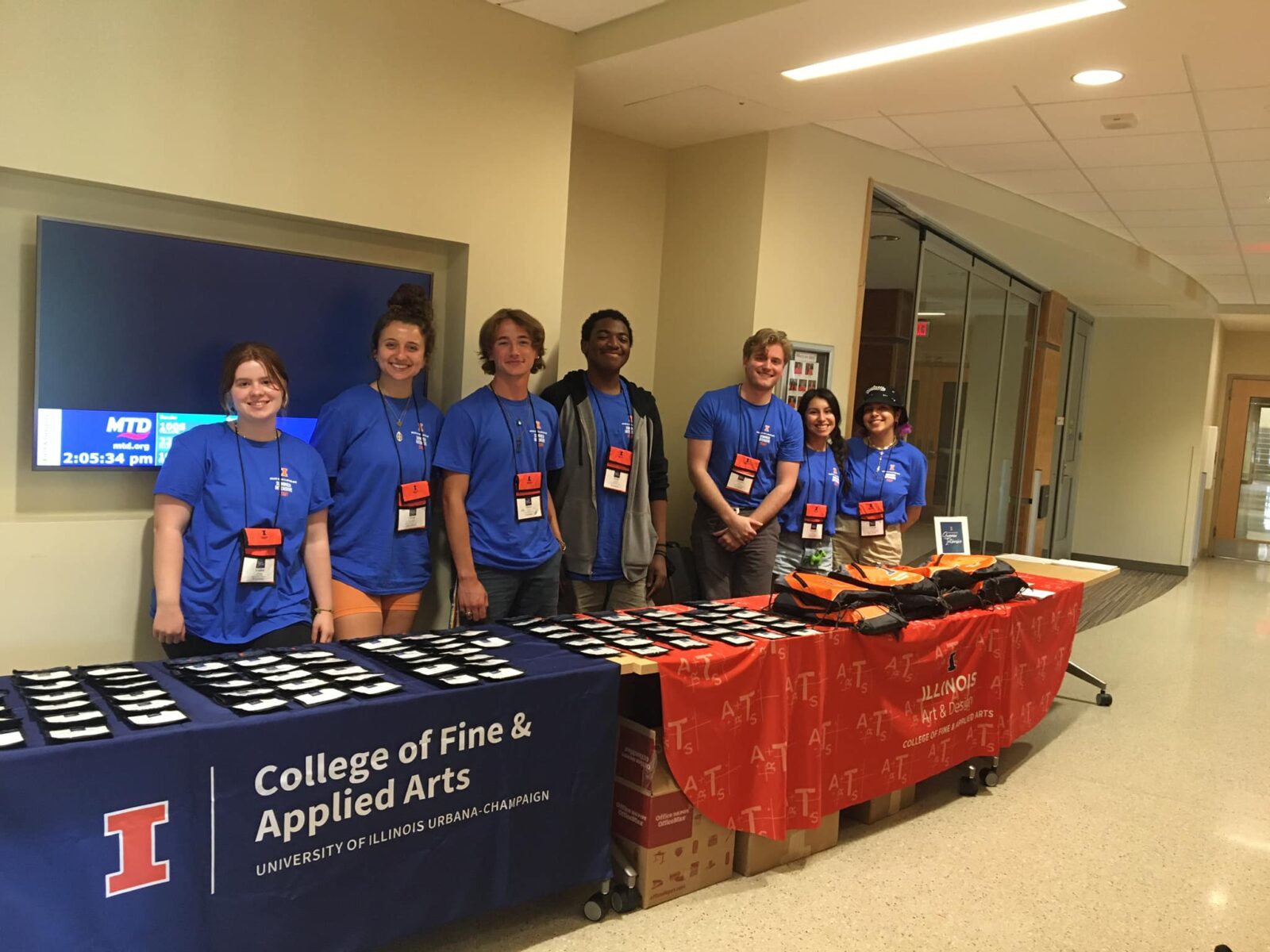 students lined up at registration to welcome new students