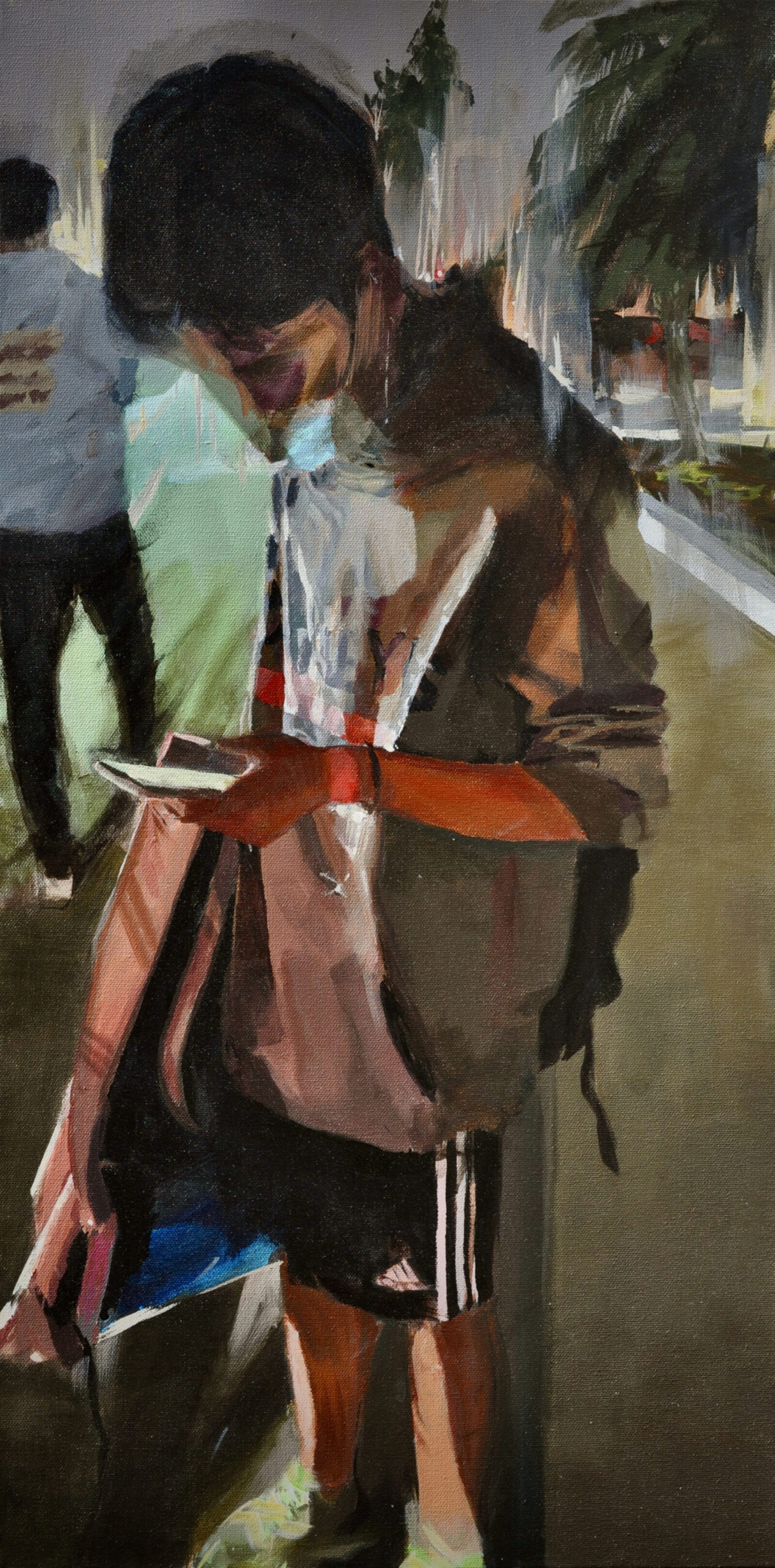 self-portrait of person looking down at phone