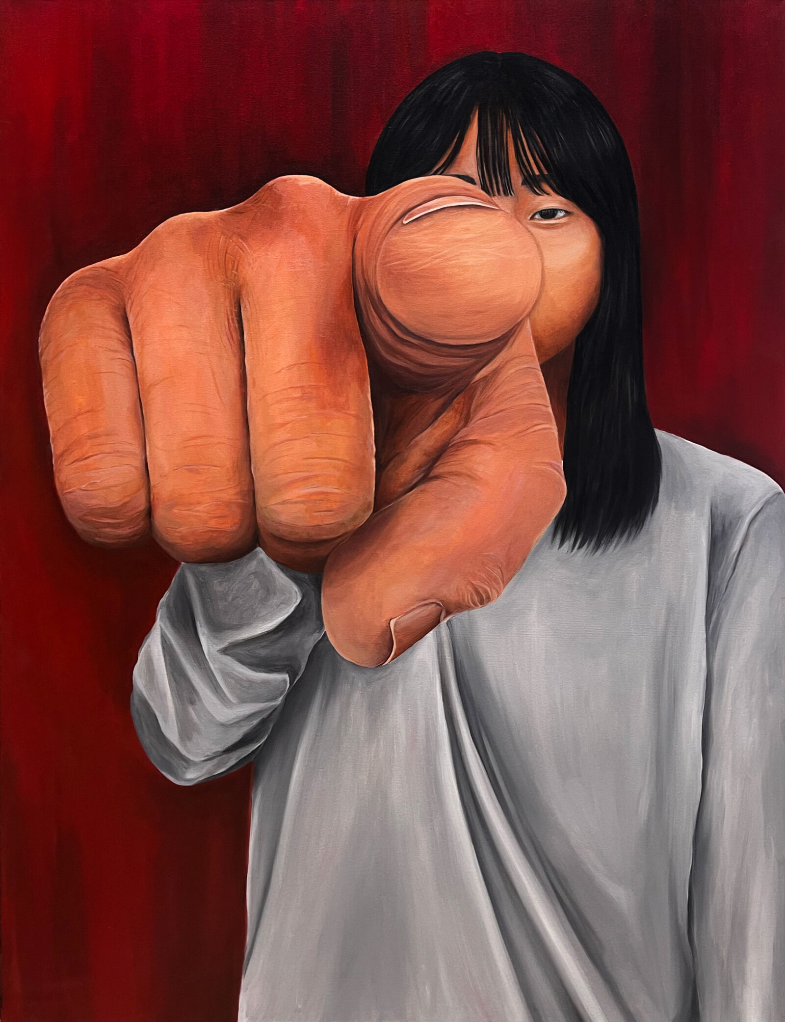 self-portrait with pointing finger in foreground