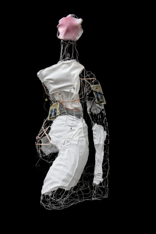 self-portrait of dress form with abstract fabric pieces