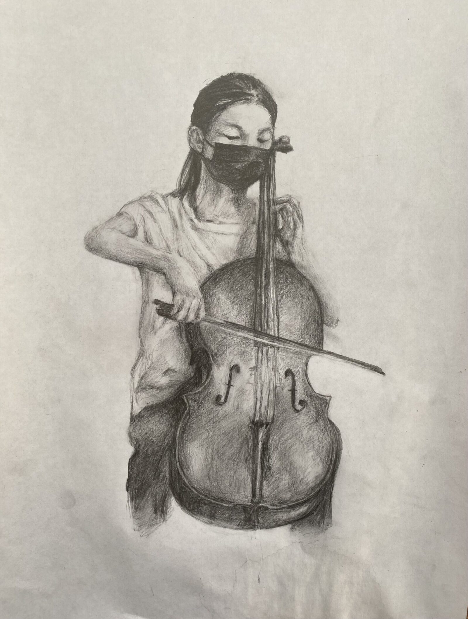 self-portrait of cello player wearing a mask