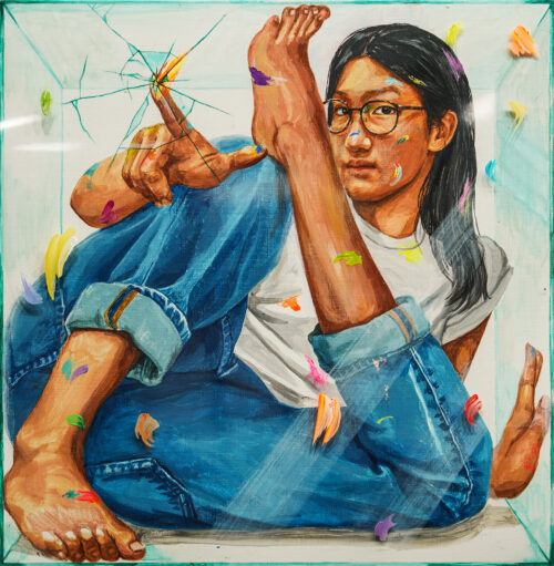 self-portrait inside glass box with one leg up