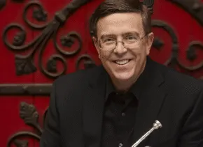 David Bilger holding trumpet