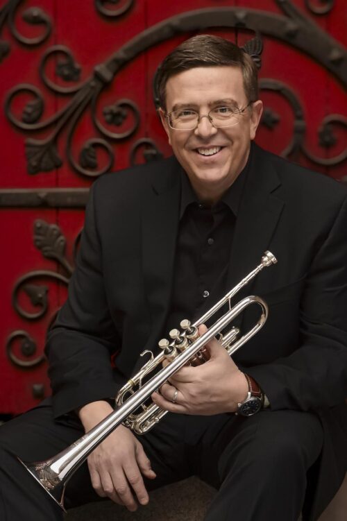 David Bilger holding trumpet