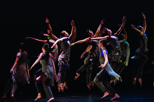 students onstage dancing