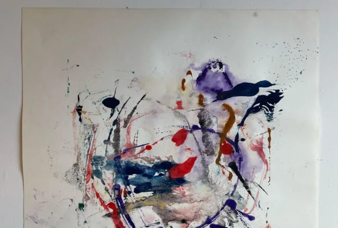 abstract painting with reds, blues, greays, purples, and browns. Looks a little like a heart