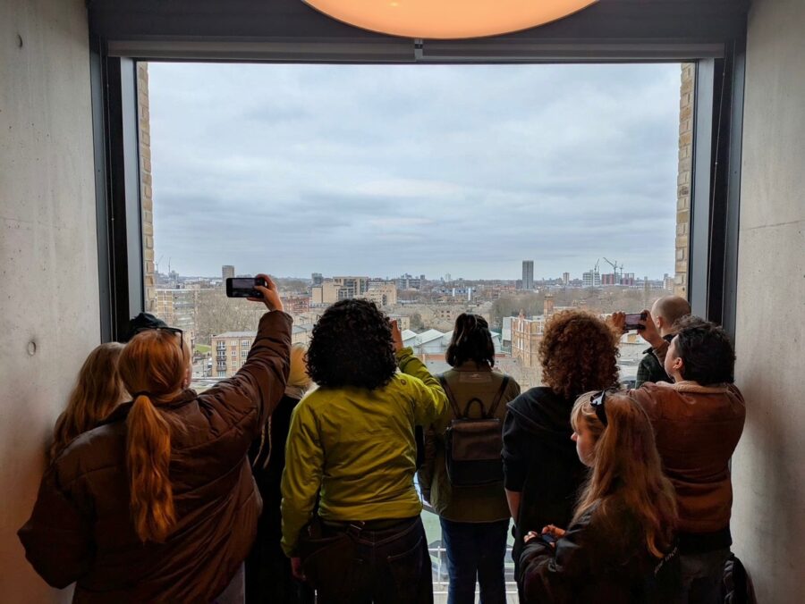 people looking out a window