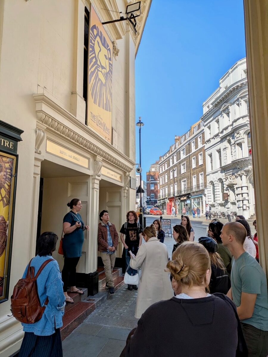 people gathered around a theatre