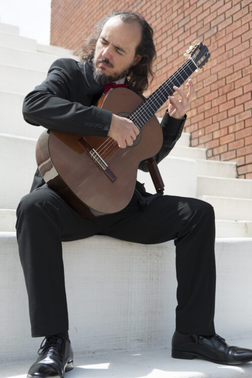 person playing guitar