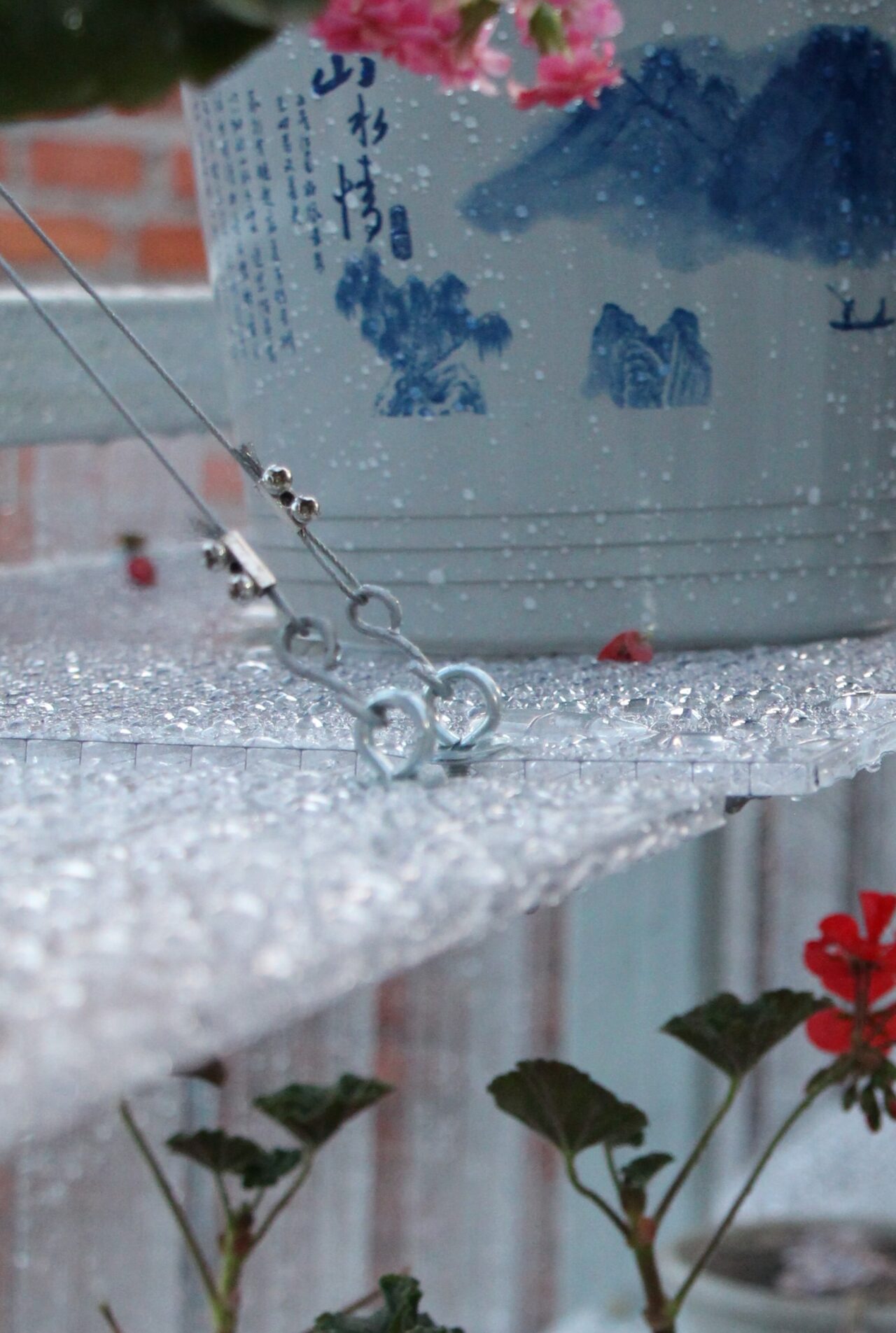 glass panes held up as shelves with plants on them