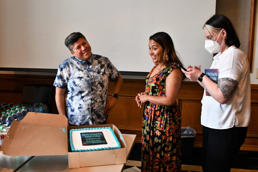 several people standing and smiling