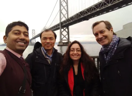 Professors Chakraborty, Zhang, and El-Gohary with Coach Glenn near Bay Bridge in San Francisco