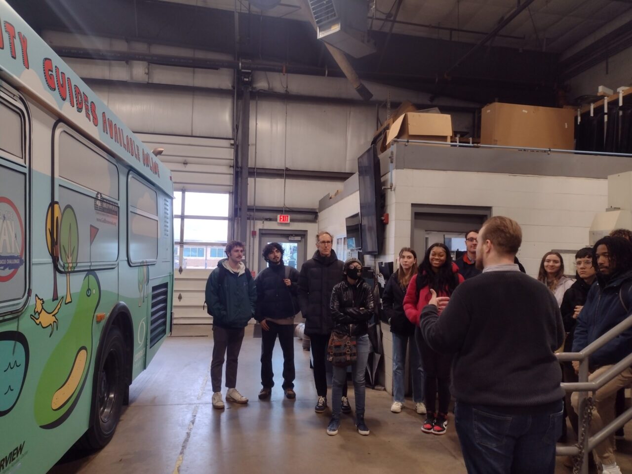 Students getting a tour of Connect Transit facility