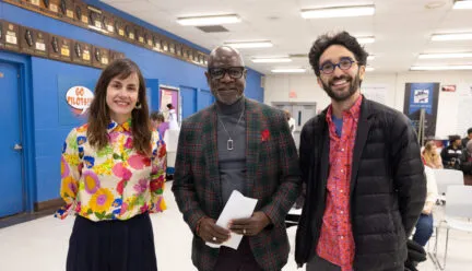 three people smiling