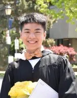 Headshot of Andrew Wei in graduation clothing 