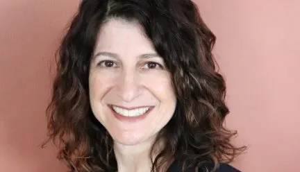 headshot of carol drucker 