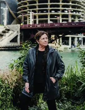 Carol Ross Barney standing next to the Chicago River 