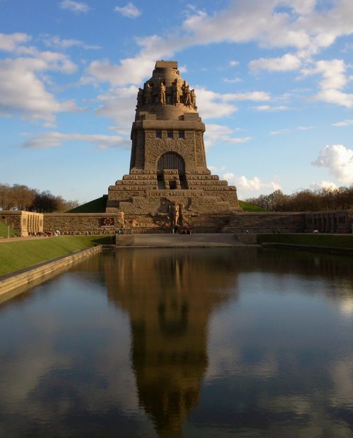 masonry temple with pool in foreground 