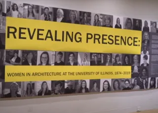 image of women's symposium exhibit titled "revealing presence" 