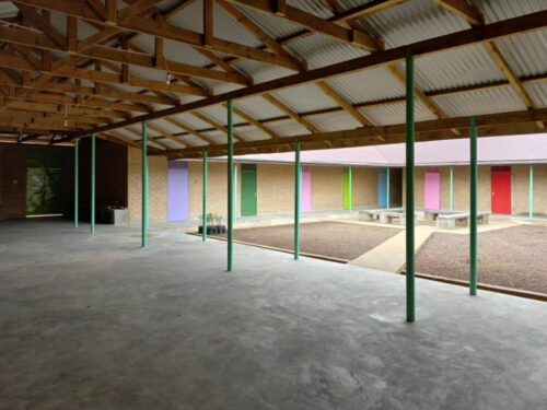 image of courtyard with colored columns and doors 