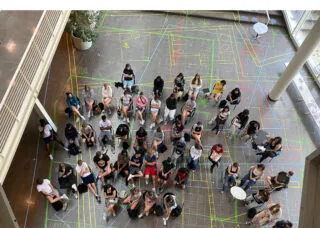 Students and Professor John Clark in Atrium