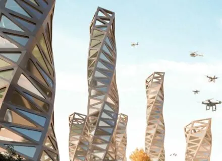 skyscrapers sunny blue sky with white clouds 