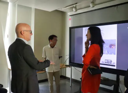 people standing around talking 