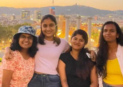 students standing in front of barcelona