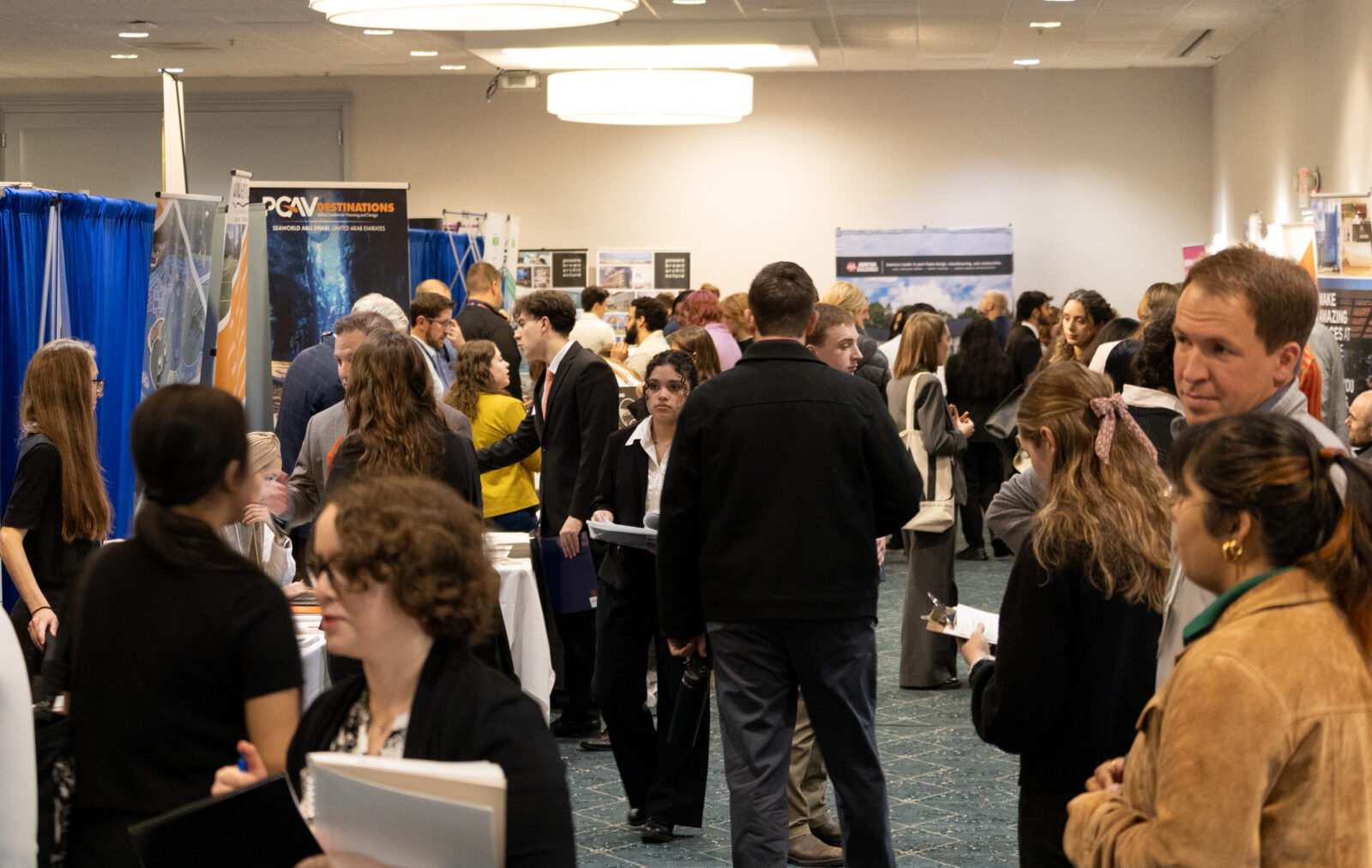 students and vendors discussing at career xpo 2025