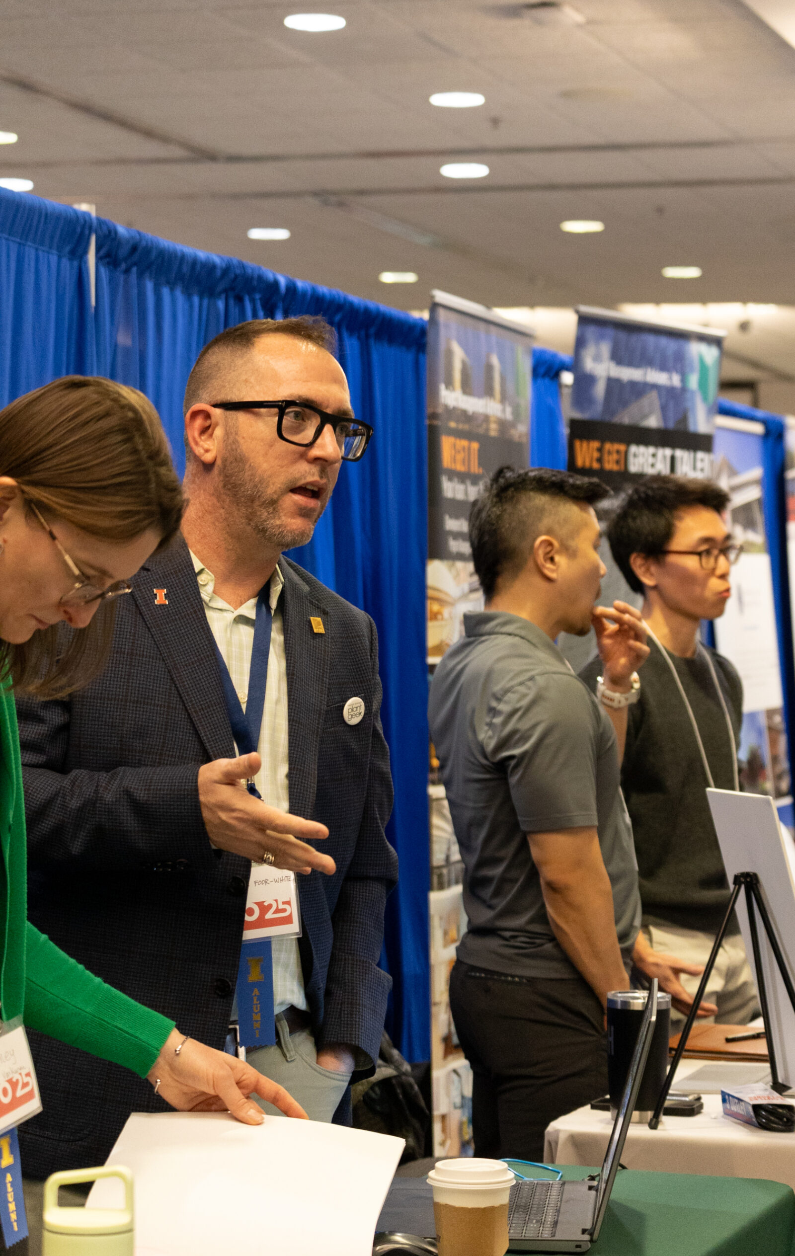 students and vendors discussing at career xpo 2025
