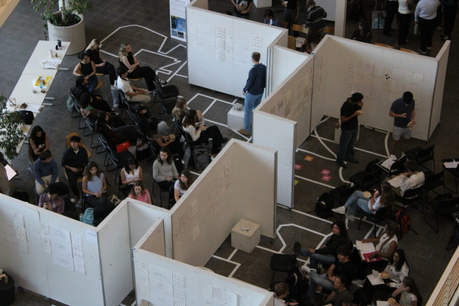an overhead view of students presenting their projects