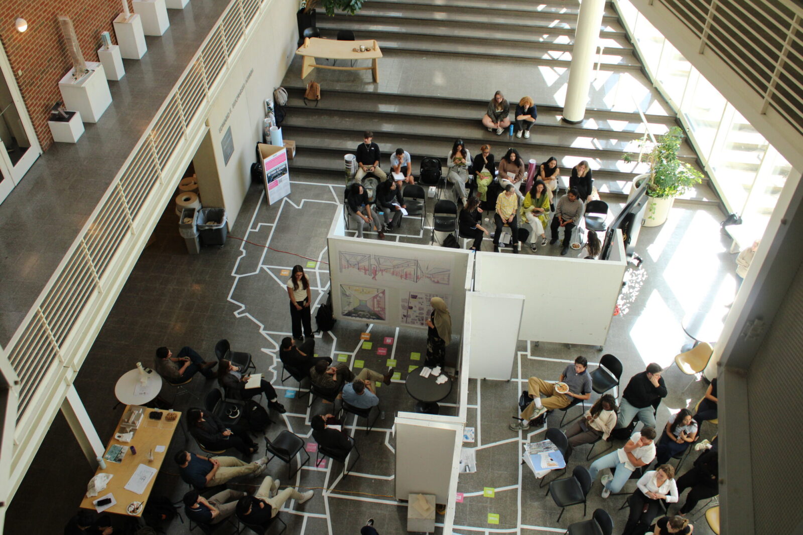 overhead view of atrium with many students