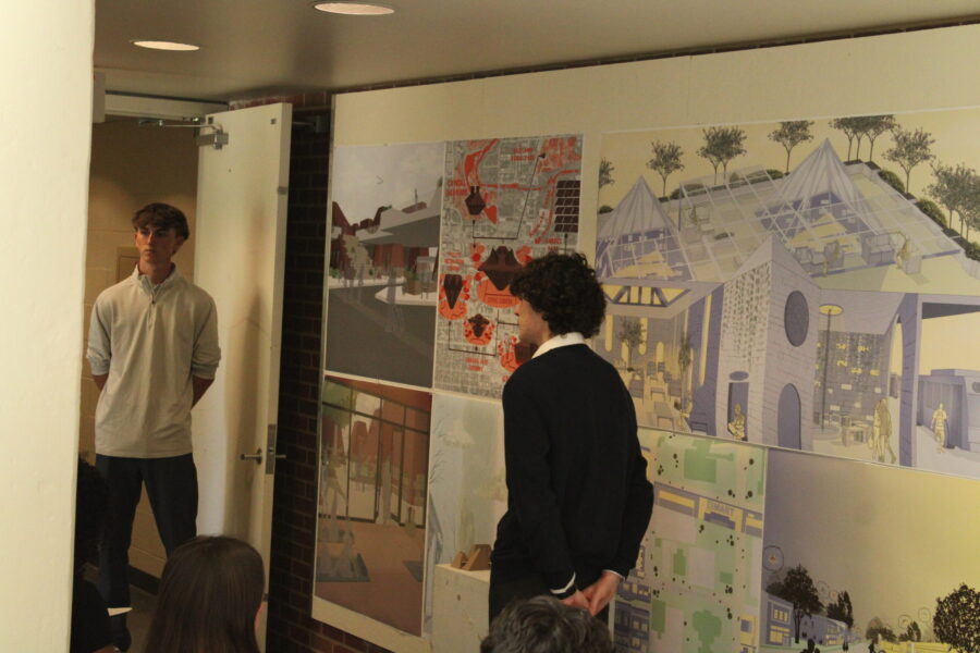 students standing in front of posters