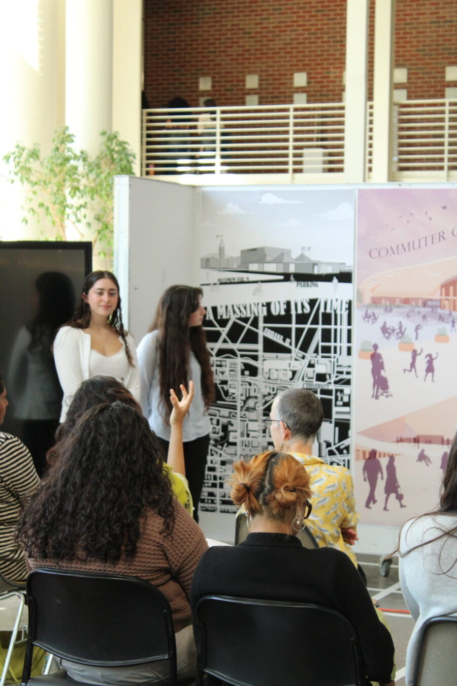 students standing in front of posters