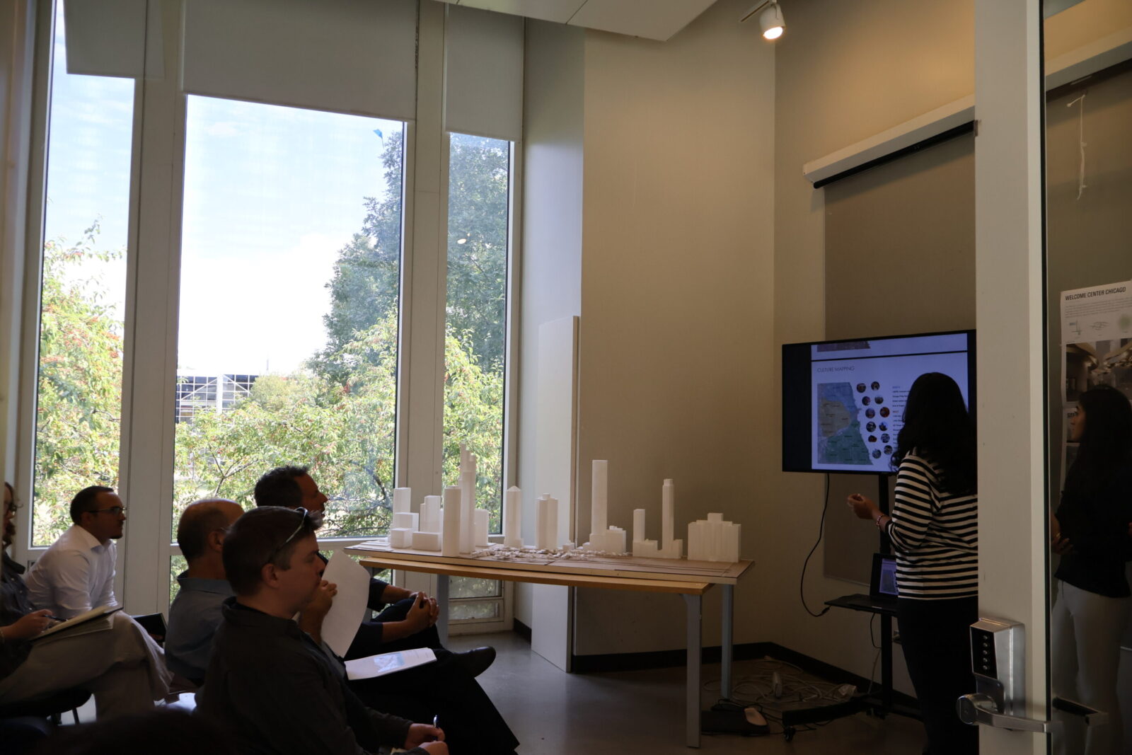 a student presenting in front of an audience