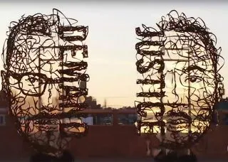 Demand Justice sculpture by Maxwell Emcays